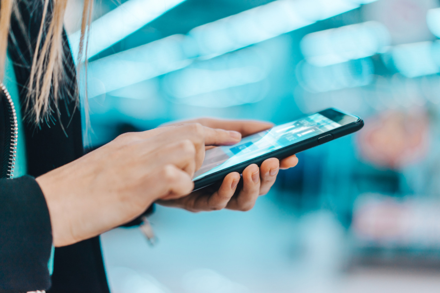 Close,Up,Cropped,Shot,Of,Female,Hands,Holding,Mobile,Phone